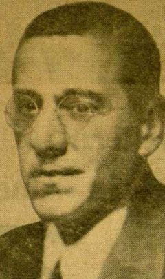 Sepia portrait of man in glasses