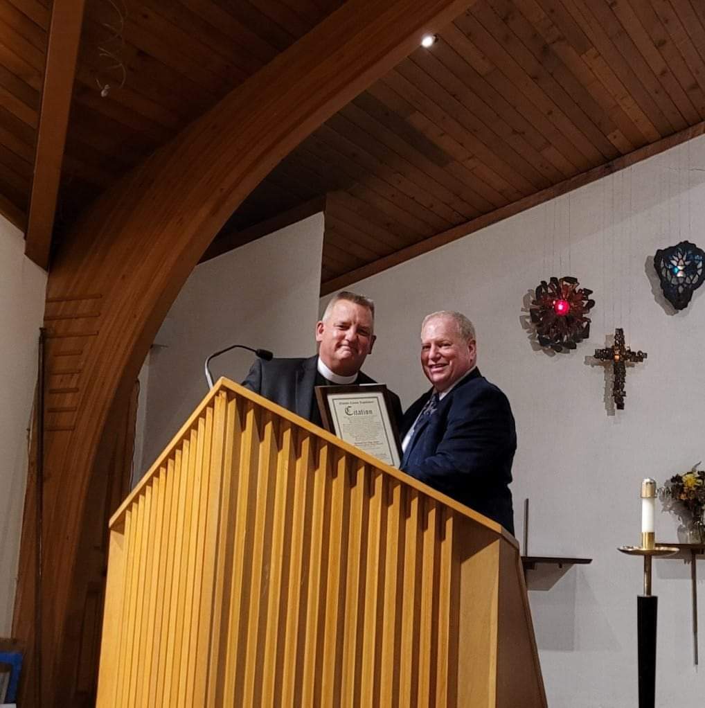 Drucker Joins Good Shepherd Lutheran Church Congregation to Honor Pastor Eric Olsen
