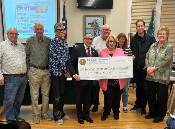 LEGISLATOR GIANGREGORIO PRESENTS CHECK TO SEAFORD HISTORICAL SOCIETY FOR NEW ROOF