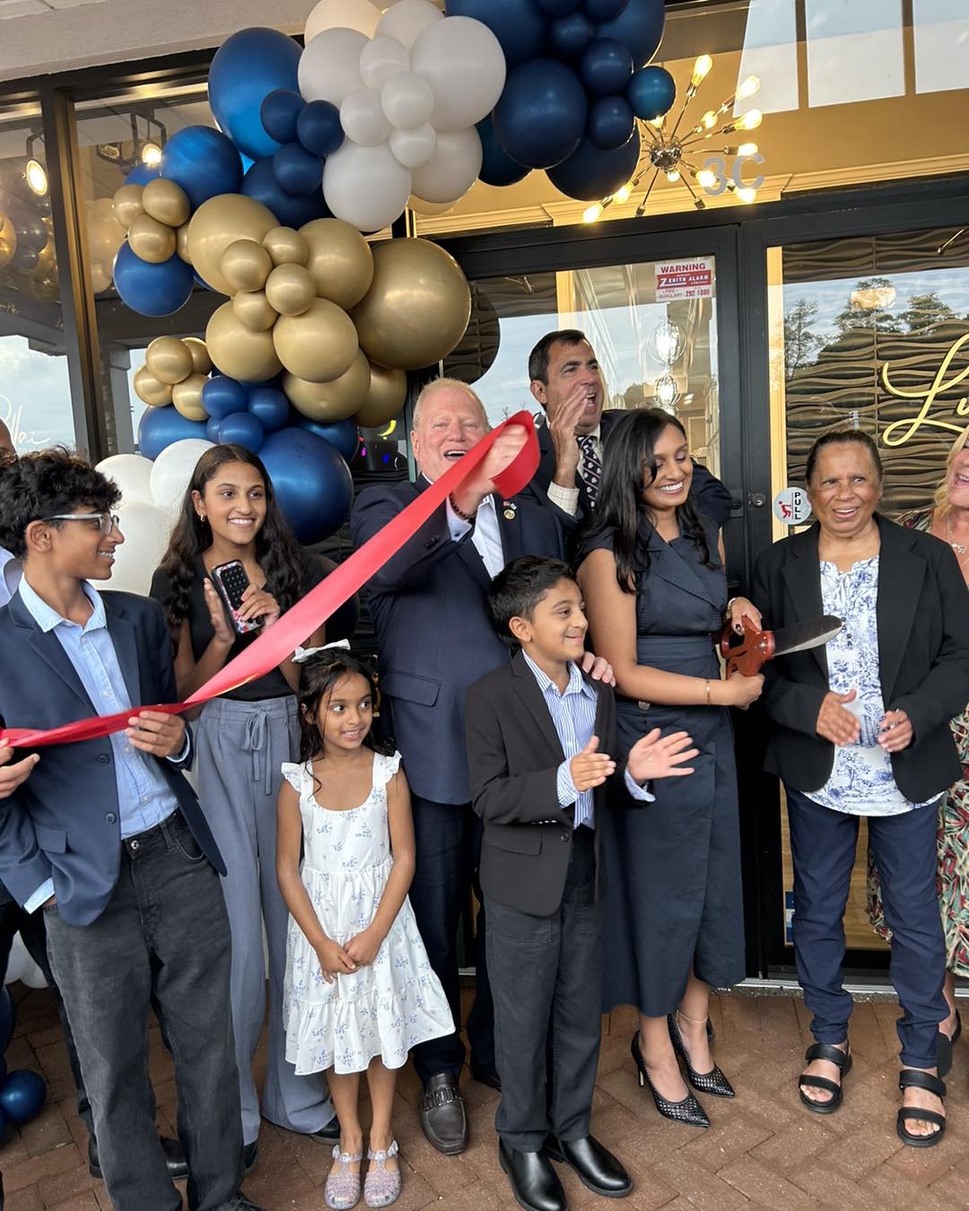 Drucker - Woodbury Ribbon Cutting 2