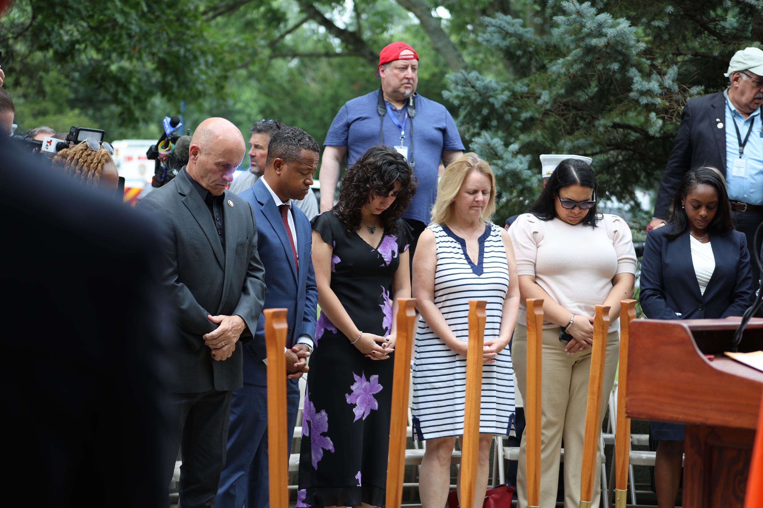 Minority Caucus - 911 memorial - heads bowed